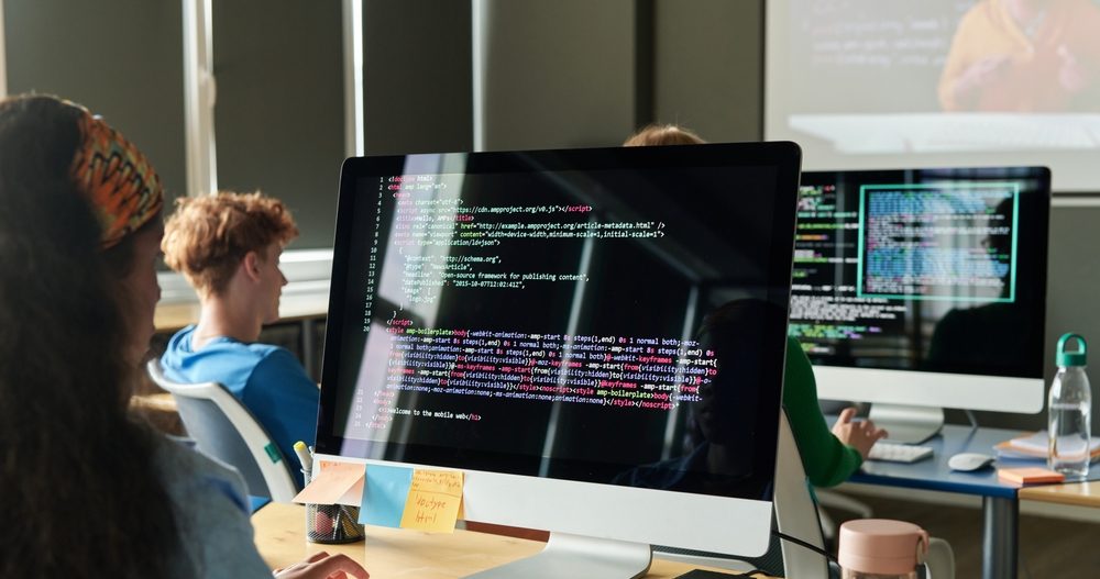 students,Writing,Computer,Code,During,Programming,Class,In,School,Or